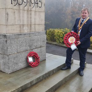 Councillor Holding A Wreath